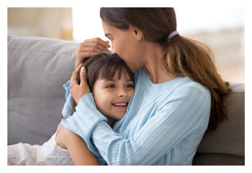 Mother holding child.